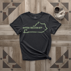 Kentucky Roots Run Deep tee in black with sage print, laid flat on weathered wood